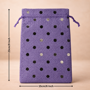 Purple drawstring bag with black and gold polka dots and measurements on a beige background