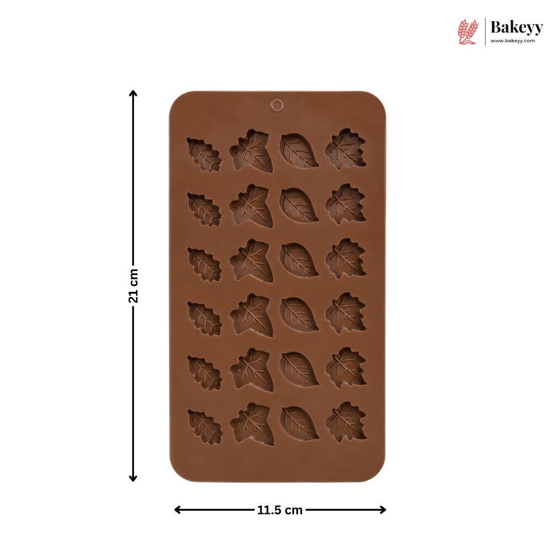 A brown silicone mold with leaf-shaped cavities, shown on a white background with dimension lines indicating 21 cm height and 11.5 cm width.
