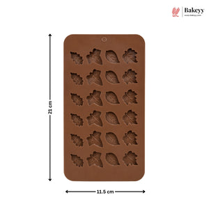 A brown silicone mold with leaf-shaped cavities, shown on a white background with dimension lines indicating 21 cm height and 11.5 cm width.