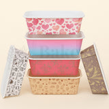 Set of colorful storage bins with various patterns on a beige background