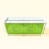 Green floral-patterned container with measurements on a beige background