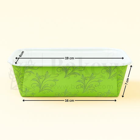 Green floral-patterned container with measurements on a beige background