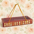 Decorative chocolate box with a clear lid on a floral background