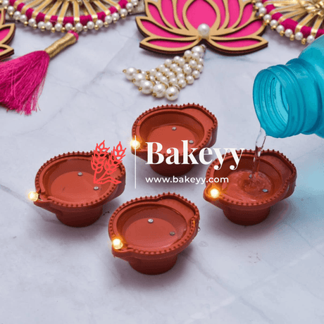 Modern Diwali Lighting: Water-Activated LED Diya for Festive Brilliance (Pack Of 6) - Bakeyy.com - India - Modern Diwali Lighting: Water-Activated LED Diya for Festive Brilliance (Pack Of 6) - Default Title