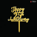 Gold metal cake topper with 'Happy 25th Anniversary' script on a black background, featuring a Bakeyy logo in the top right corner.