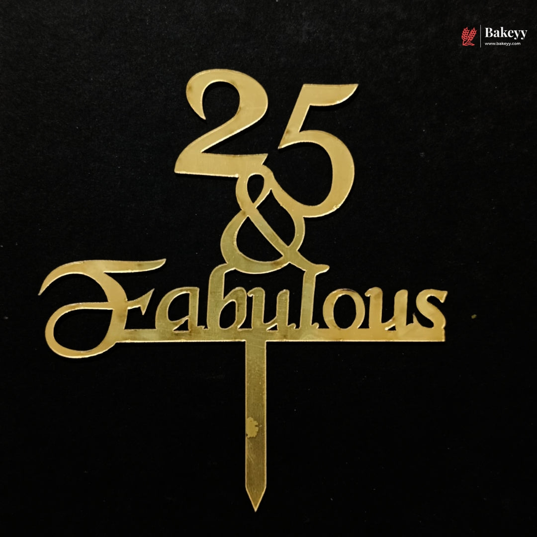 Gold metallic cake topper with the text '25 & Fabulous' on a black background, featuring a small Bakeey logo in the top right corner.