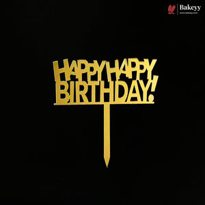 Gold metal 'HAPPY HAPPY BIRTHDAY!' cake topper with a stick, shown on a solid black background. A Bakeyy brand logo is visible in the top right corner.