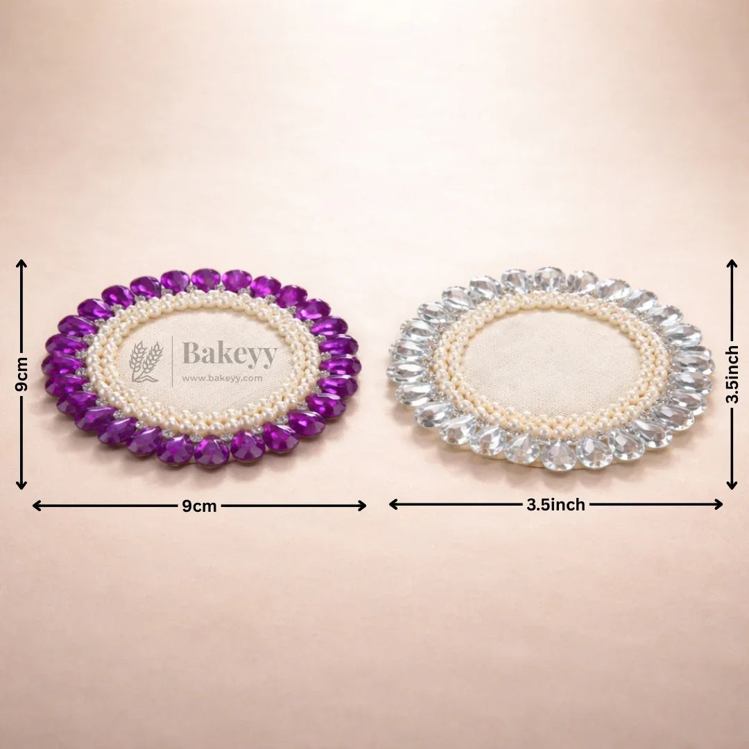 Bakeyy decorative round coasters with pearl and crystal borders in purple and clear, 9cm each, shown on beige background.