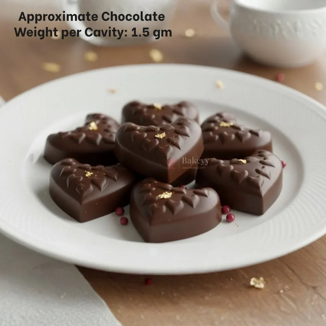 Heart-shaped chocolates with gold leaf on white plate, Bakeyy bakery supplies product