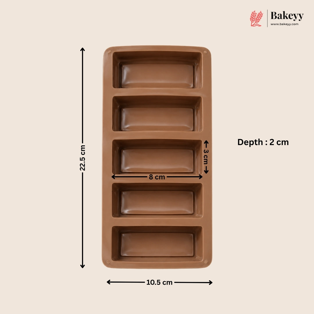 A brown rectangular silicone mold with four deep loaf cavities, shown with dimension annotations: 22.5 cm height, 10.