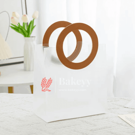 21x11x22 cm| Premium Transparent Gift Bags | Leather Style Brown Colour Handles| Pack of 10 | - Bakeyy.com - India - {{ variant.name }}