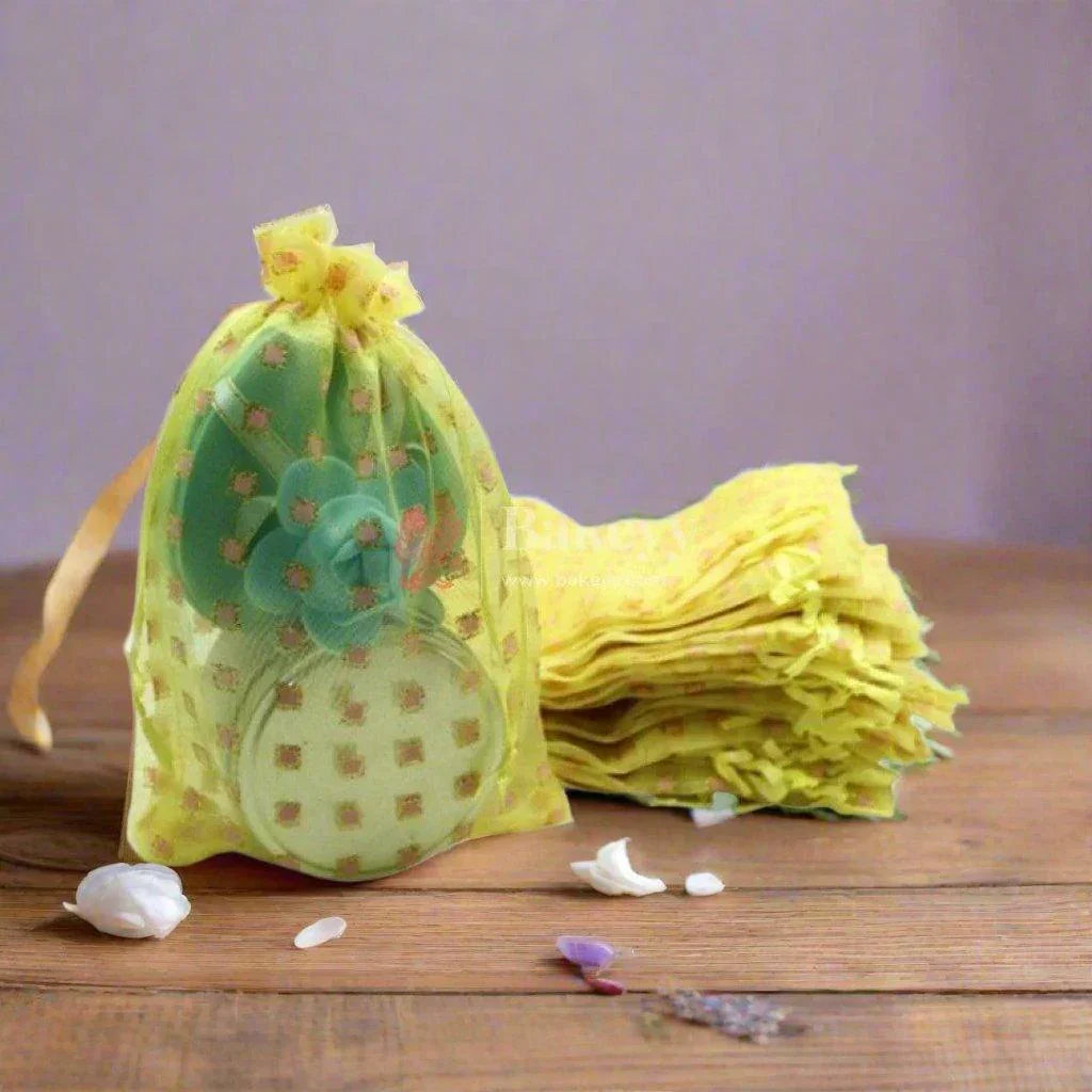 5x7-inch-or-dotted-designs-organza-potli-bags-or-pack-of-100-or-yellow-color-or-candy-bag-or-pack-of-100-bakeyy-com-1 - Bakeyy.com