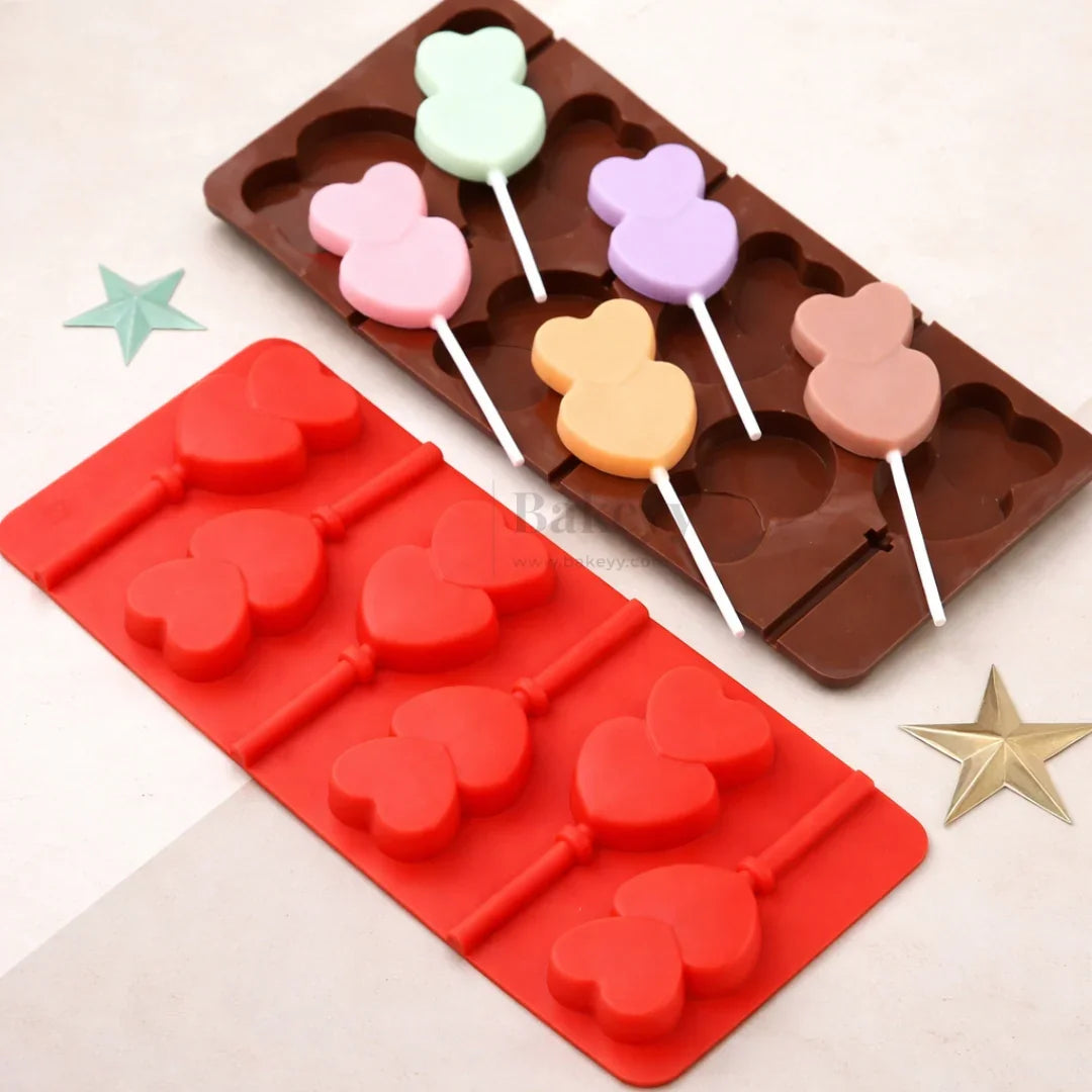 6CavityDoubleHeartShapeSiliconeChocolate_CandyLollipopMould_2 - Bakeyy.com