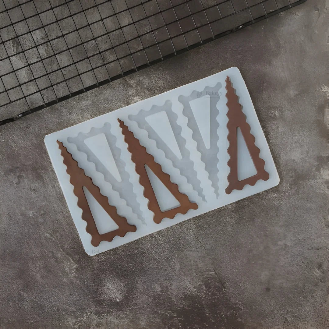 6CavityScallopedTriangleFrameSiliconeMould - Bakeyy.com