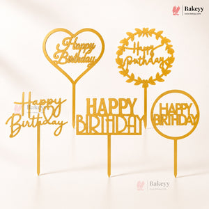 Gold 'Happy Birthday' cake toppers with different designs on a white background, featuring the Bakeyy brand.