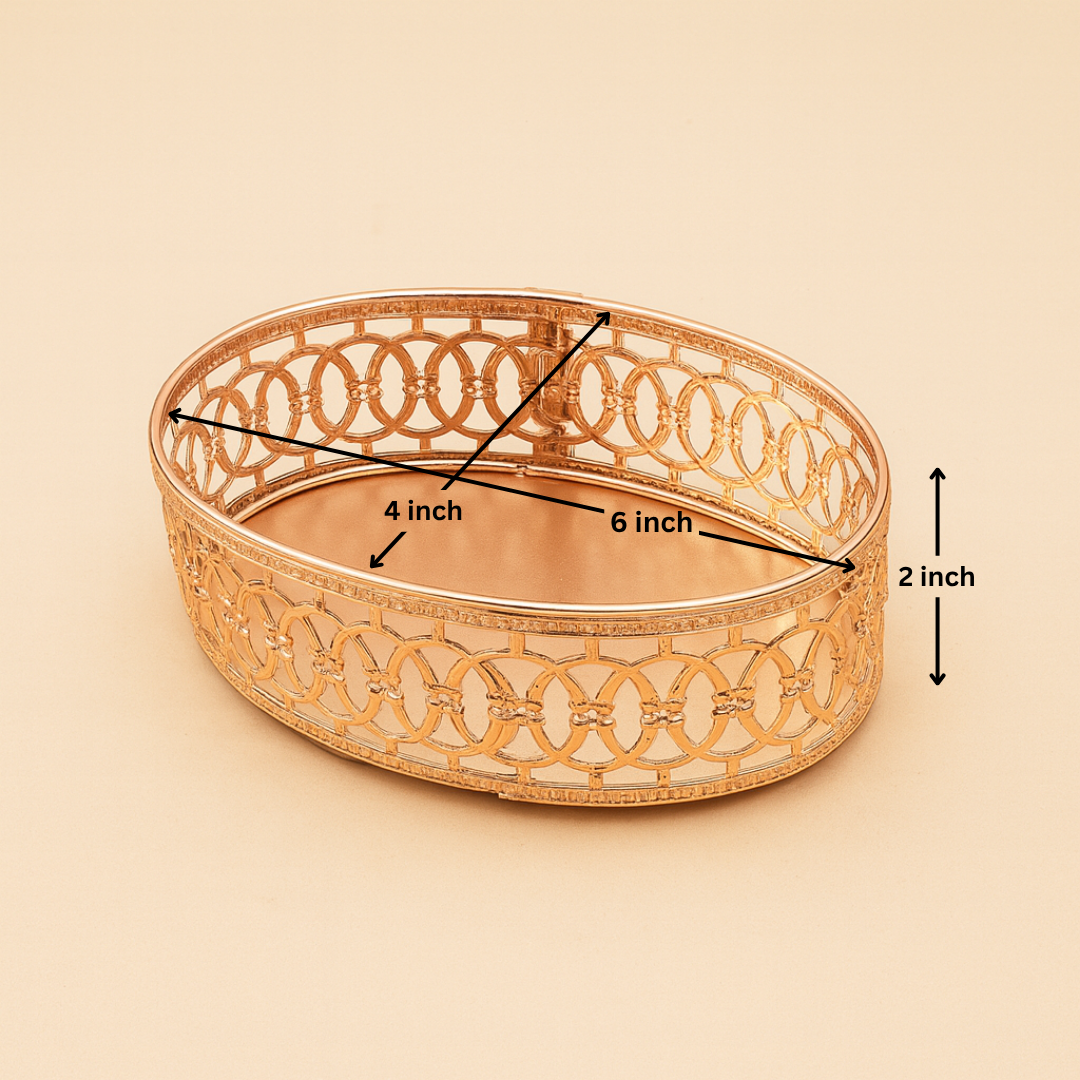 Decorative gold bowl with dimensions labeled on a beige background