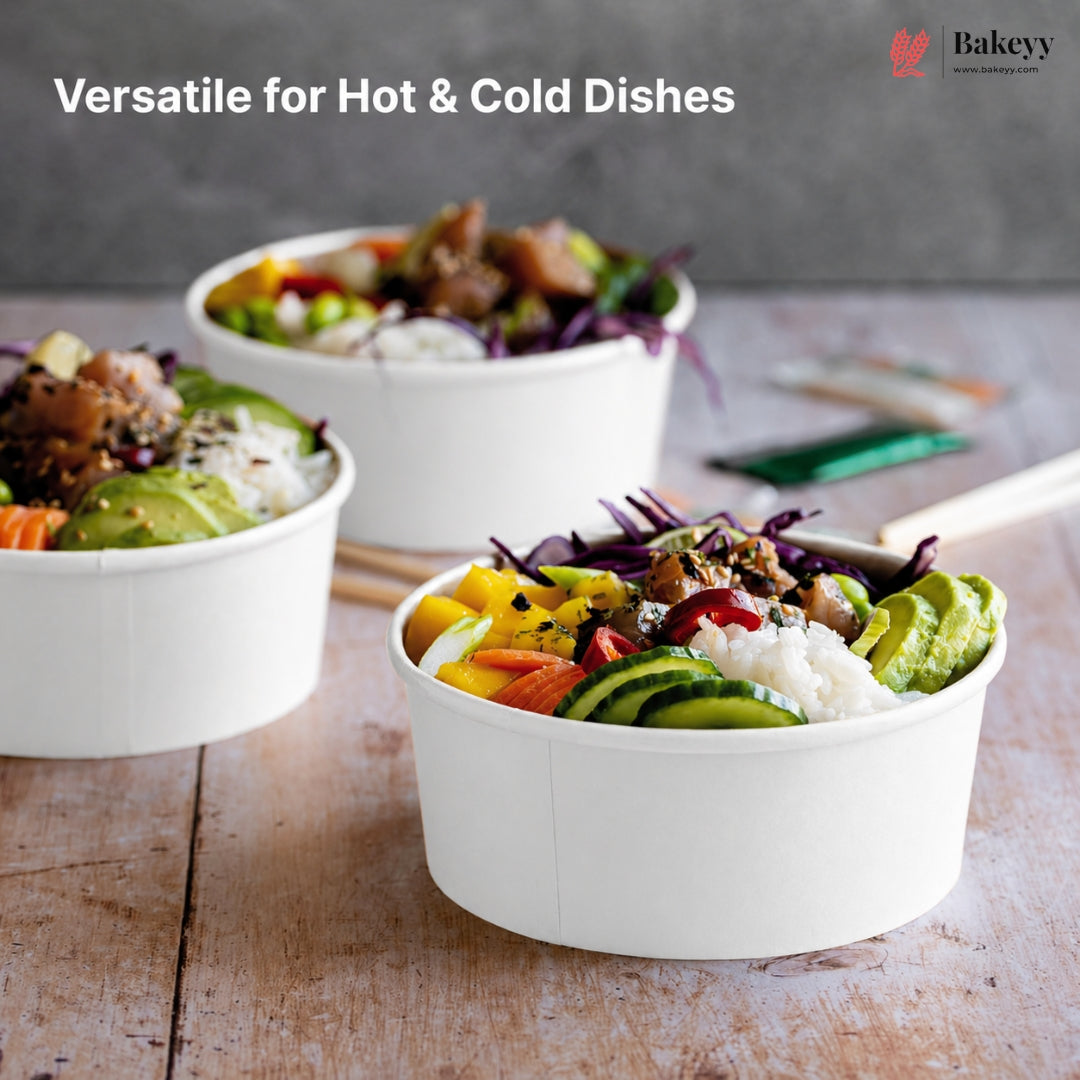 White bowls filled with colorful food on a wooden surface, with 'Bakeyy' branding.