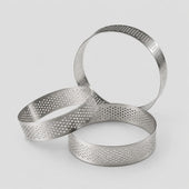 Set of three metal ring cookie cutters on a light gray background
