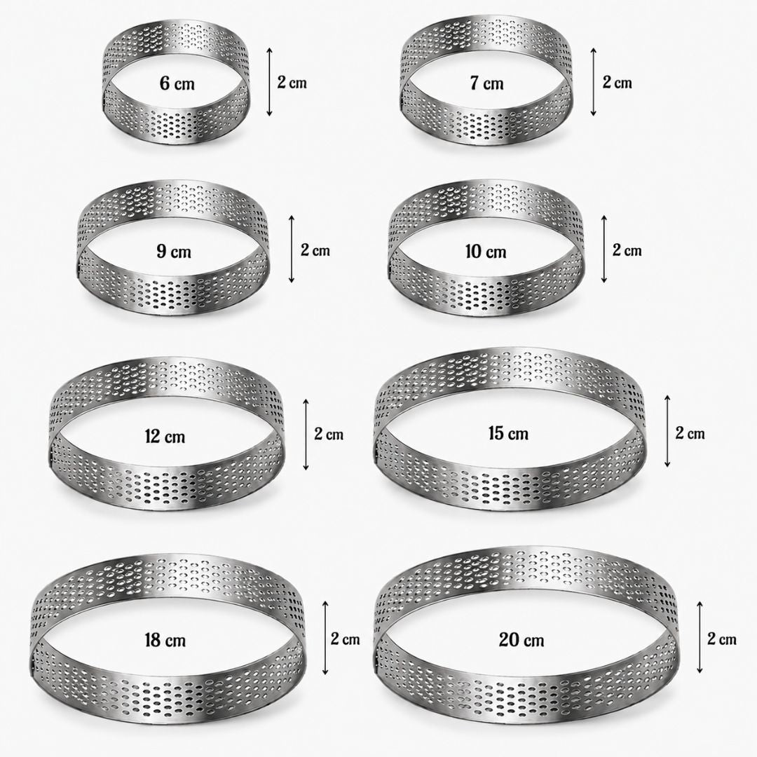 Set of metal ring molds with varying diameters on a white background