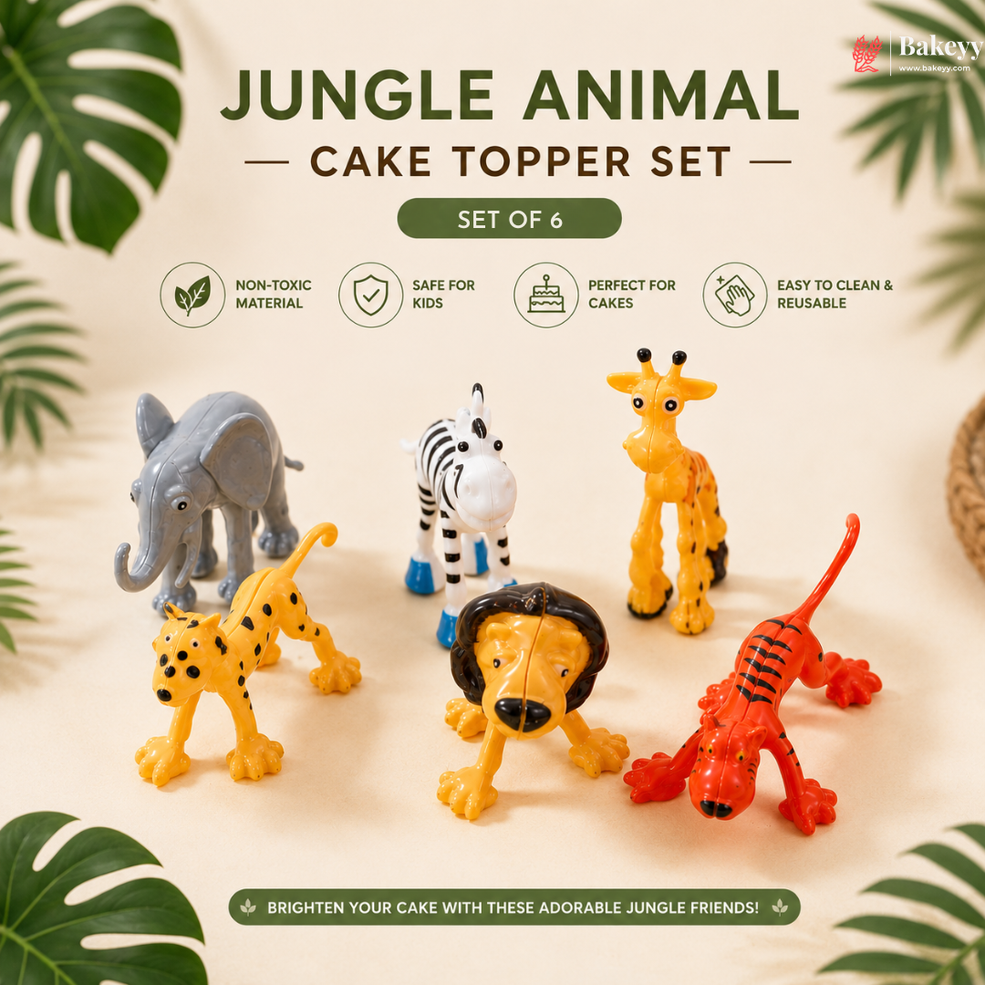 Jungle animal cake topper set with elephant, zebra, giraffe, leopard, lion, and tiger on a beige background with green leaves.
