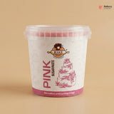 Container of pink sugar paste with 'Bakey' branding on a beige background