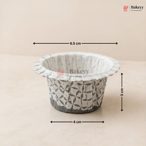 Bakey disposable cup with geometric pattern and measurements on a beige background