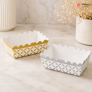 Two decorative paper trays with geometric patterns on a marble surface, featuring the brand 'Bakey'.