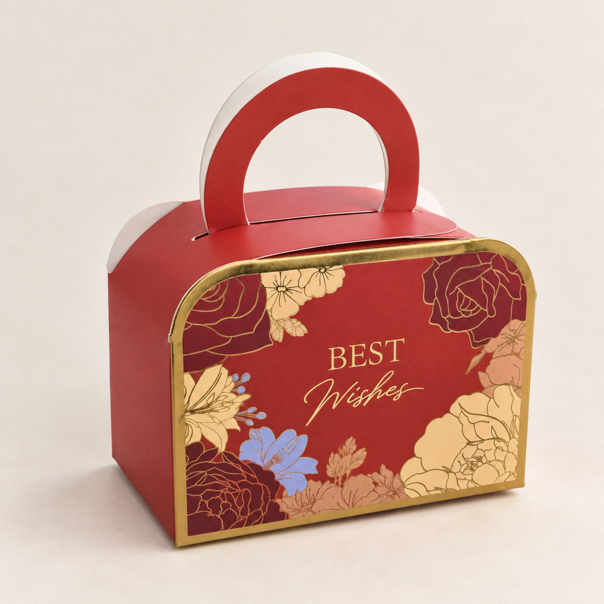 A red gift box with a curved handle, decorated with gold floral illustrations and the words 'BEST Wishes' on the front, set against a plain light beige background.