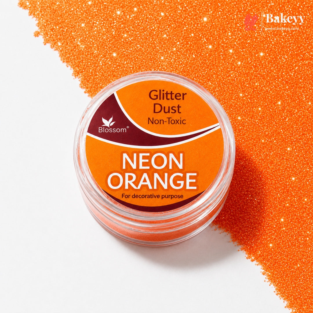 Neon orange glitter dust container with 'Blossom' branding on a white background