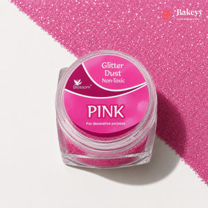 Pink glitter dust in a clear container with a pink label, on a white background.