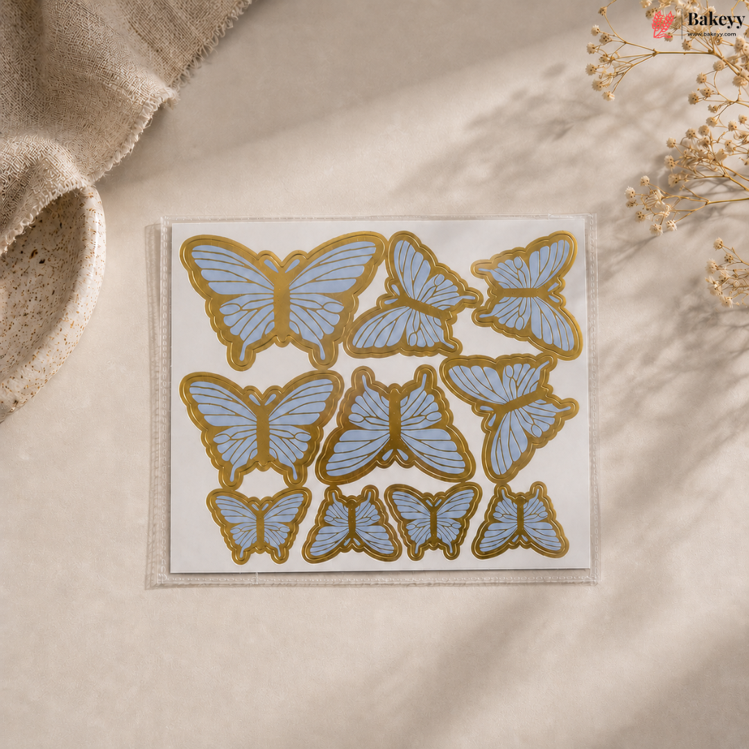 Butterfly-shaped stickers on a beige surface with a natural background