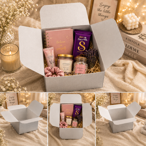 Open gift box with various items on a warm-toned background