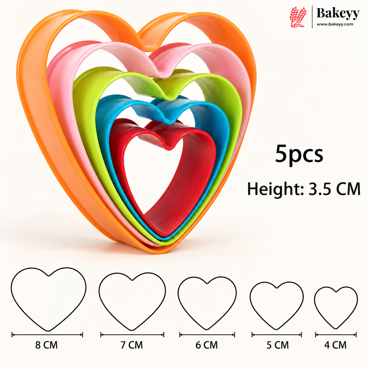 Five nested heart-shaped cookie cutters in orange, pink, green, blue, and red, shown with size text and a row of heart outline sizes from 8 cm to 4 cm. The Bakeyy brand logo appears in the top right.