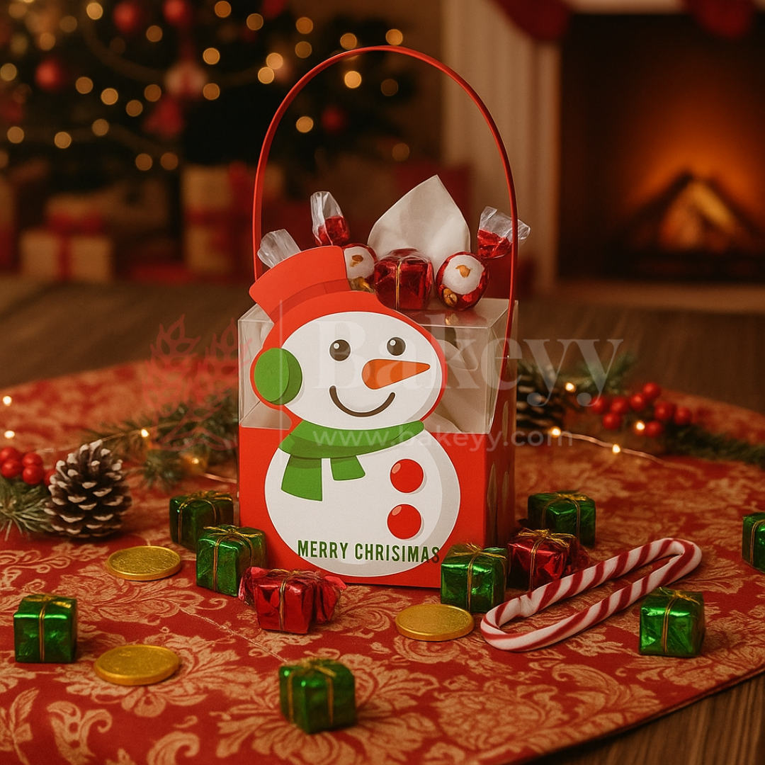 Christmas-themed gift bag with snowman design on a festive table with candy and decorations.