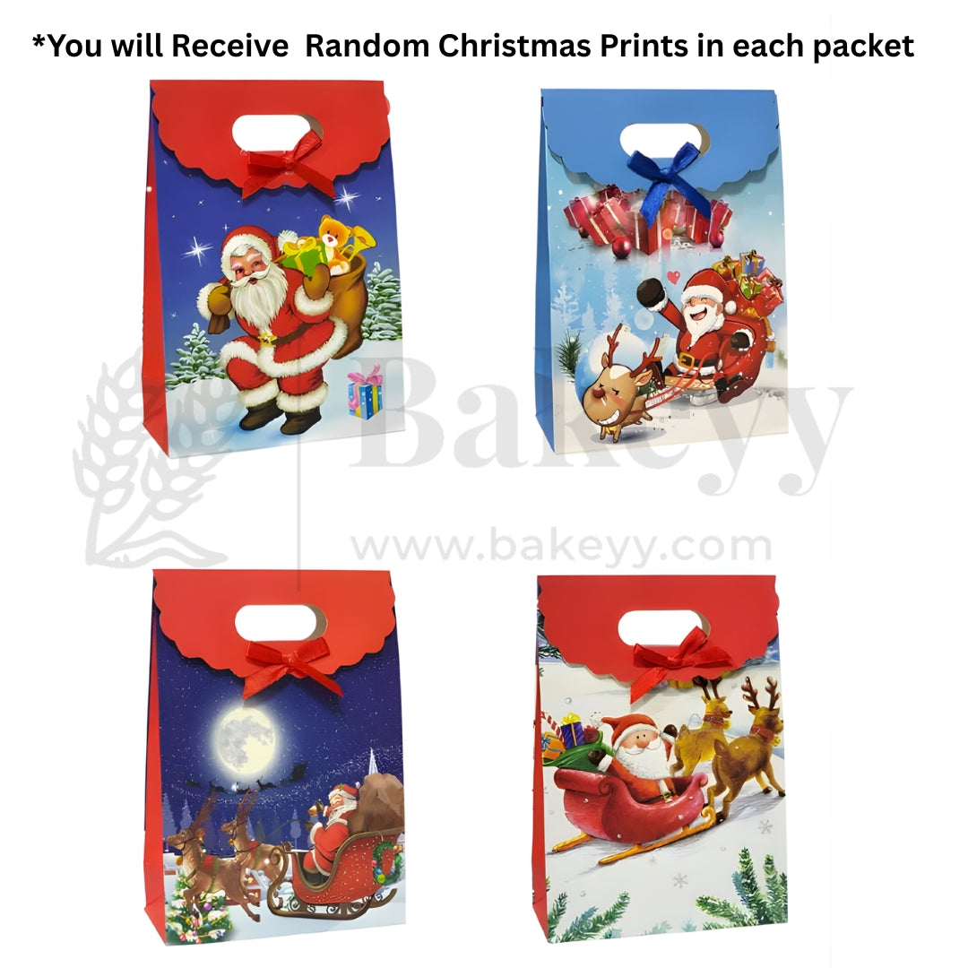 Four Christmas-themed gift bags with Santa Claus and reindeer designs on a white background.