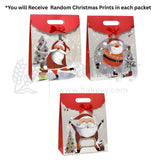 Three Christmas-themed gift bags with Santa Claus designs on a white background.