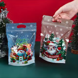 Two Christmas-themed packaging bags with Santa Claus and snowman designs on a red and green background.