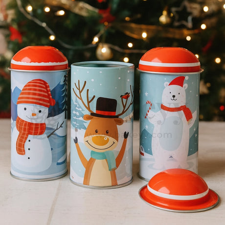 Three decorative tins with cartoon characters on a Christmas-themed background