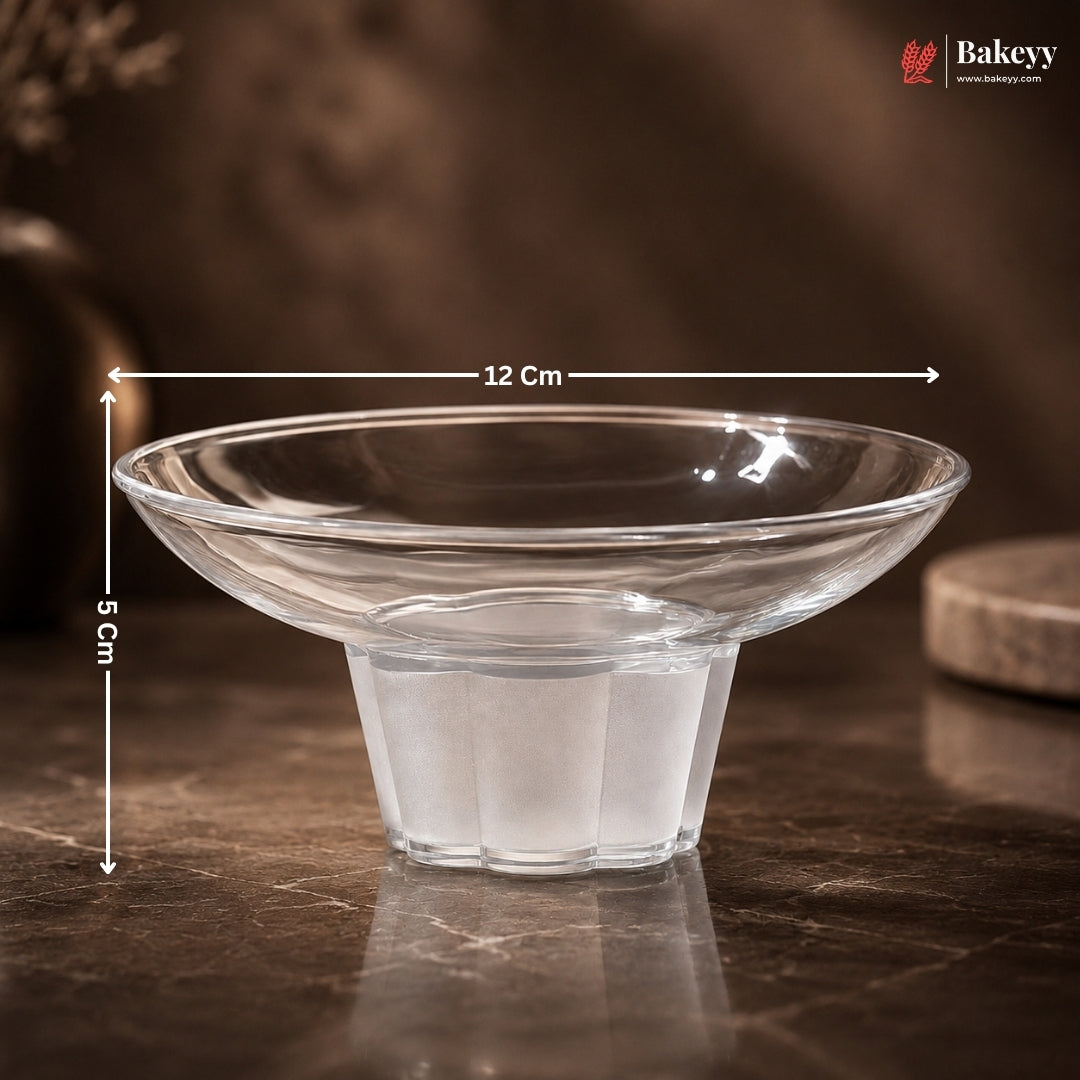 Clear glass bowl with dimensions on a dark surface, featuring the Bakeey brand.