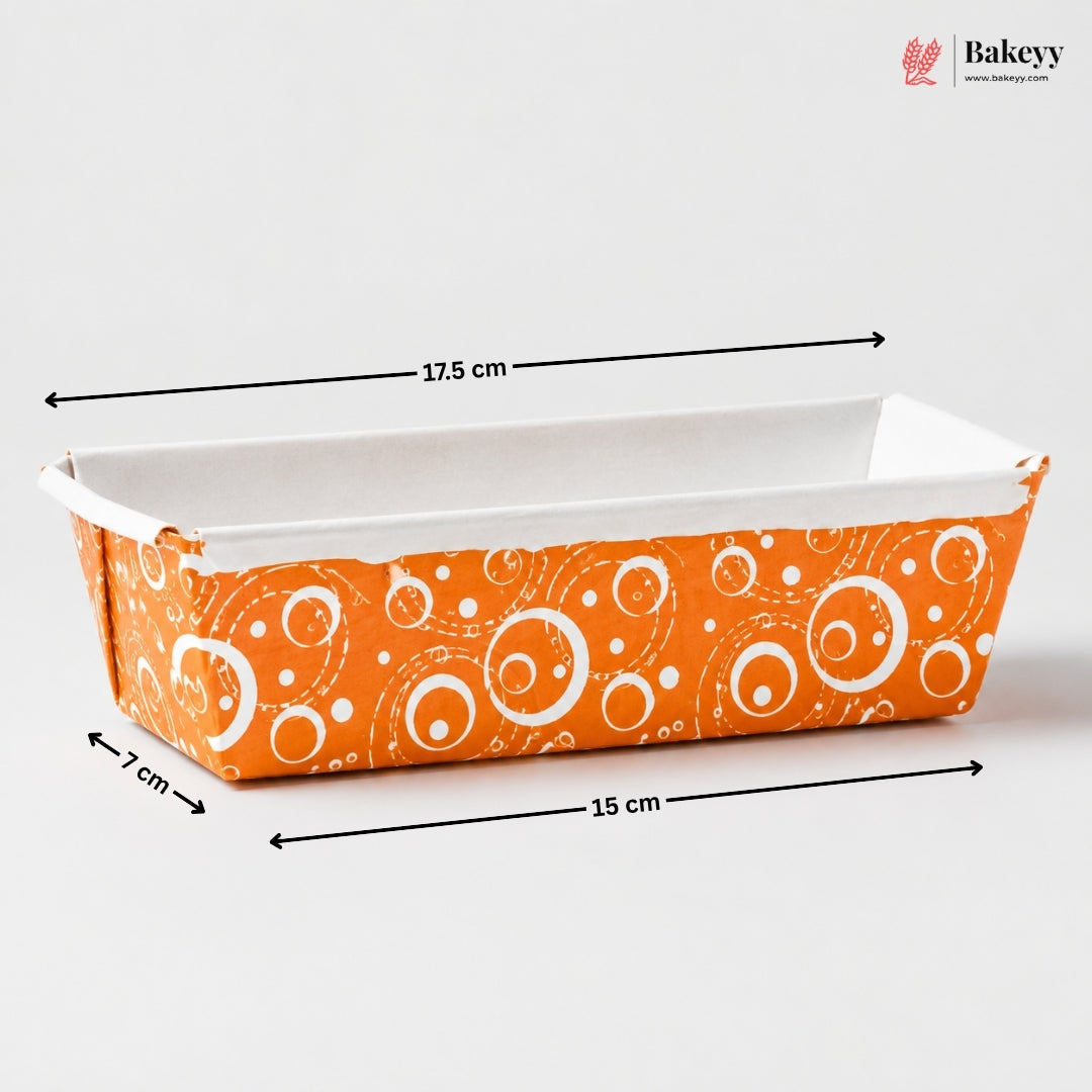 Bakeware loaf pan with orange and white pattern, measurements indicated, on a white background