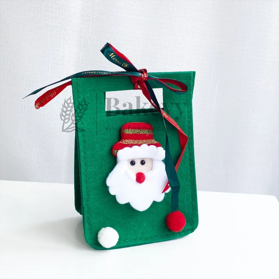 Green felt bag with a Santa Claus decoration on a white background