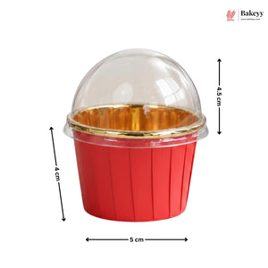 Red cupcake container with gold interior and clear dome lid, dimensions indicated, on a white background.