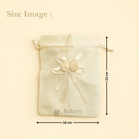 Ivory textured gift bag with ribbon and flower, 18x23 cm, Bakeyy hamper packaging.