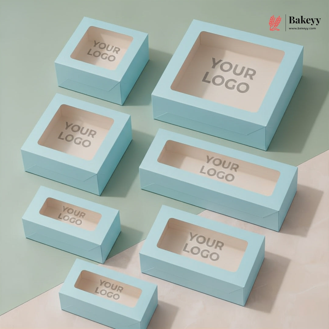 Light blue boxes with clear windows and 'YOUR LOGO' text on a gradient background, featuring the Bakeyy brand.