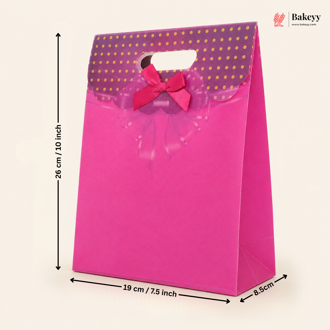 Pink gift bag with a bow and measurements on a white background