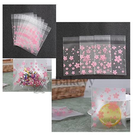 Clear cellophane bags with pink floral designs on a white background