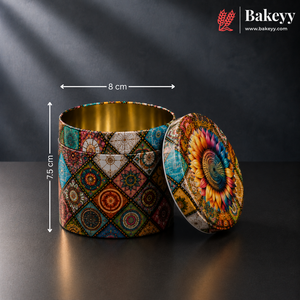 A round metal tin container with a colorful geometric and floral mandala pattern, shown open with its lid leaning against it. White dimension lines indicate a height of 7.