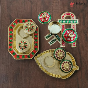 Decorative items with red, green, and gold colors on a wooden surface