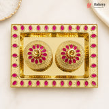 Gold and pink decorative item with 'Bakeyy' branding on a white background