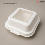A white textured plastic food container with a clear square window on top, shown on a neutral gray background with 'Material: Plastic' text and a Bakeey logo in the upper right.